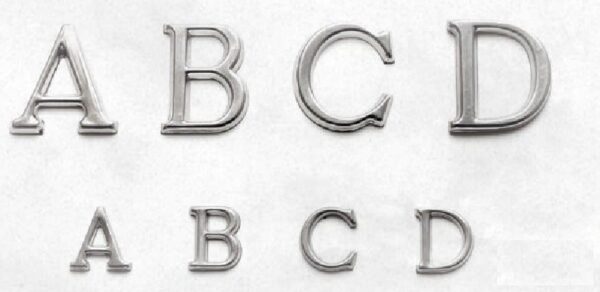 Letras troqueladas de acero inoxidable